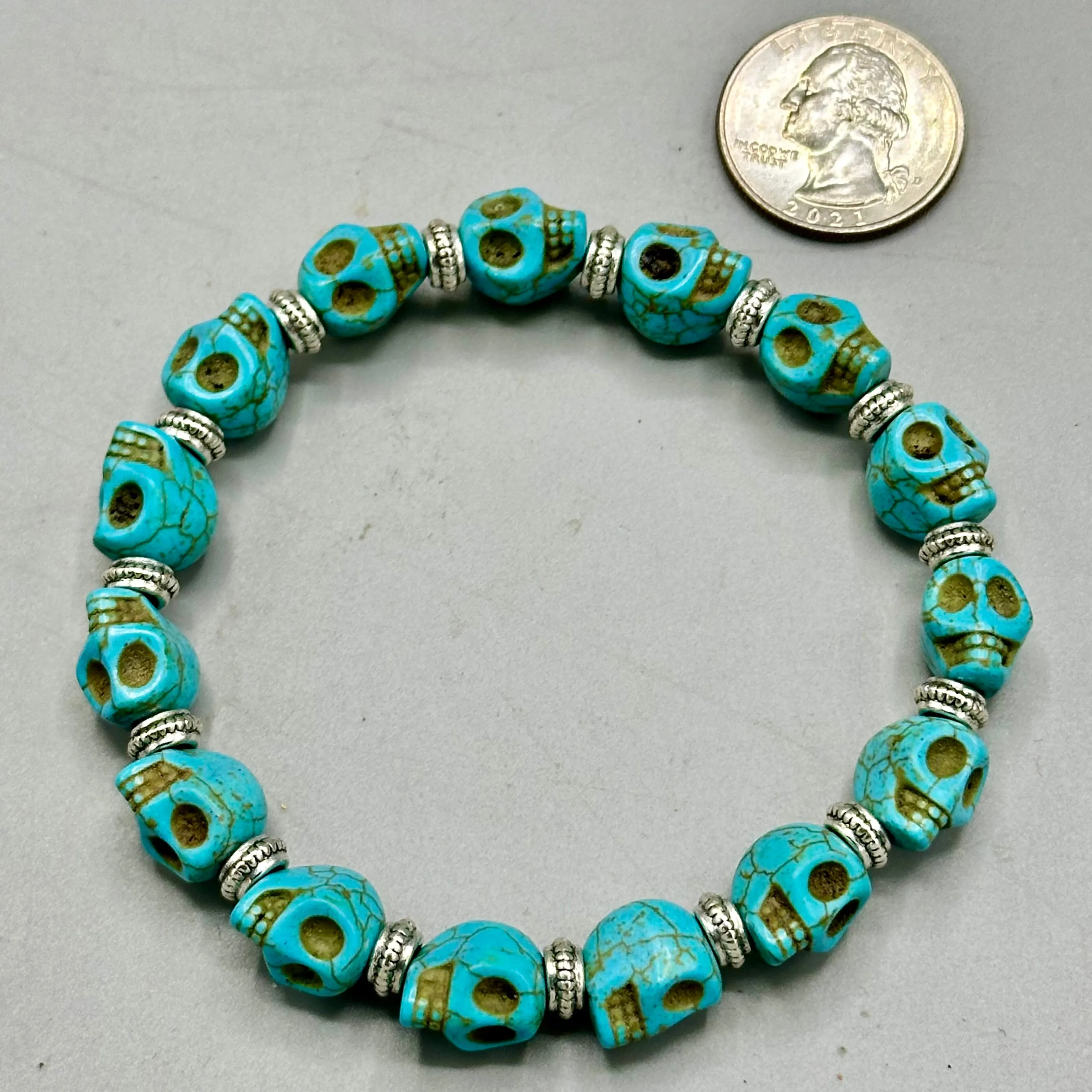 Light Blue Skulls and Brass Bracelet