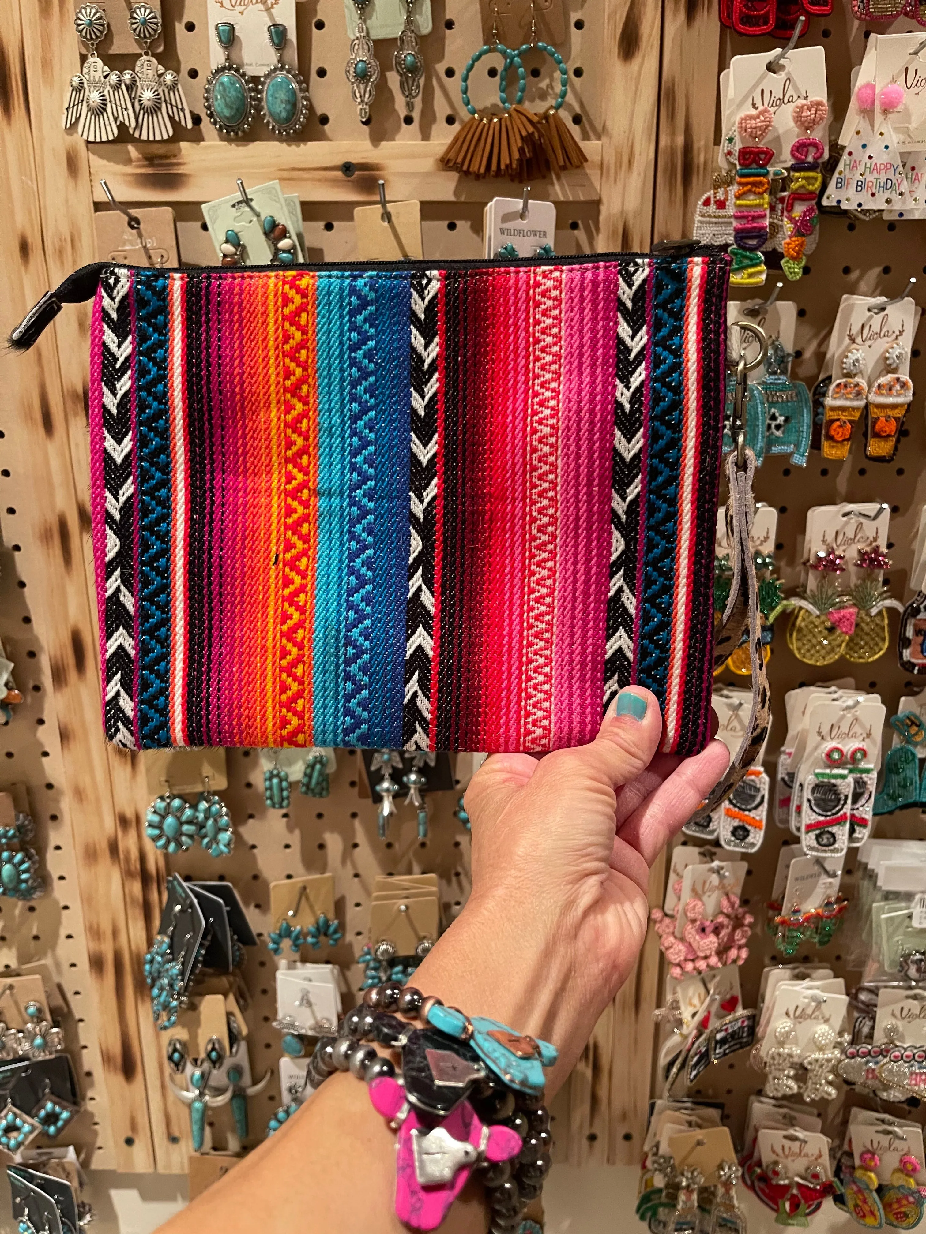 Serape cowhide make up bag wristlet